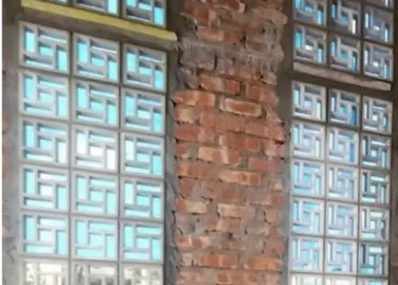 Biscuit block panel set into a boundary wall