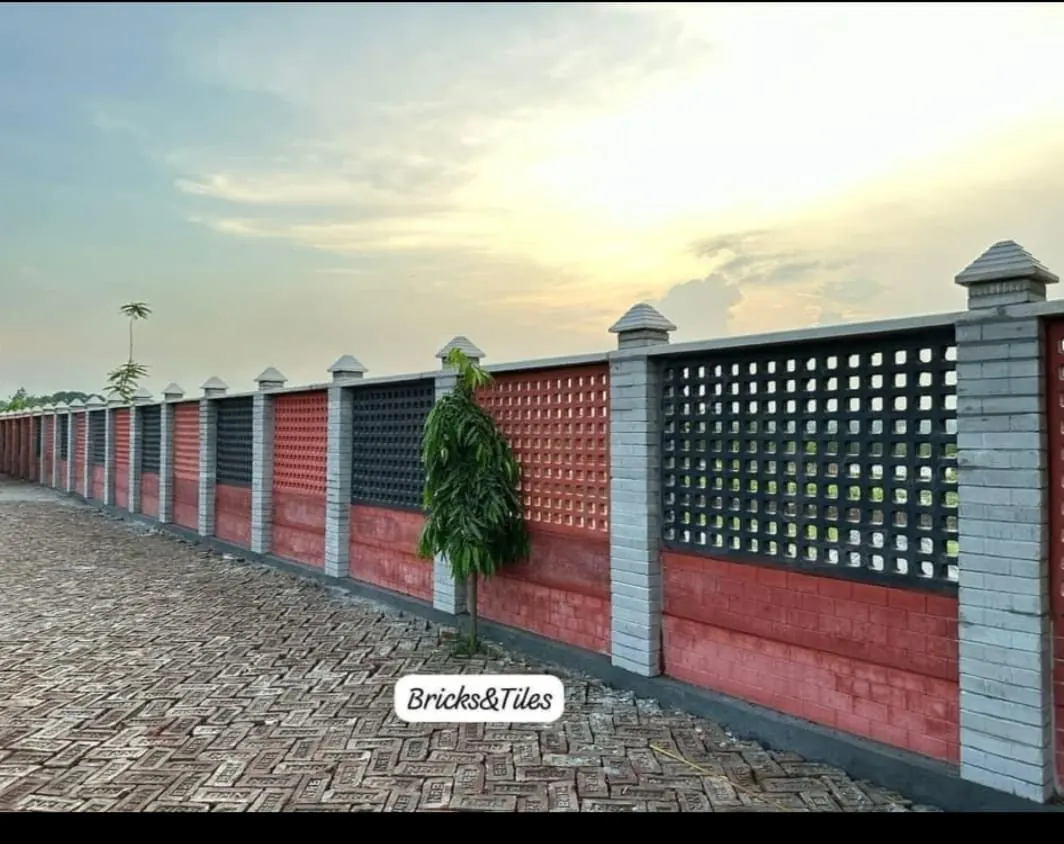 Boundary wall combining solid panels and jali screen