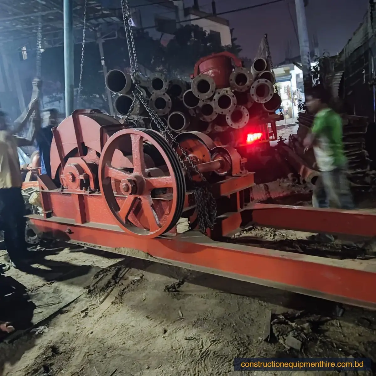 Winch and pipes during night work