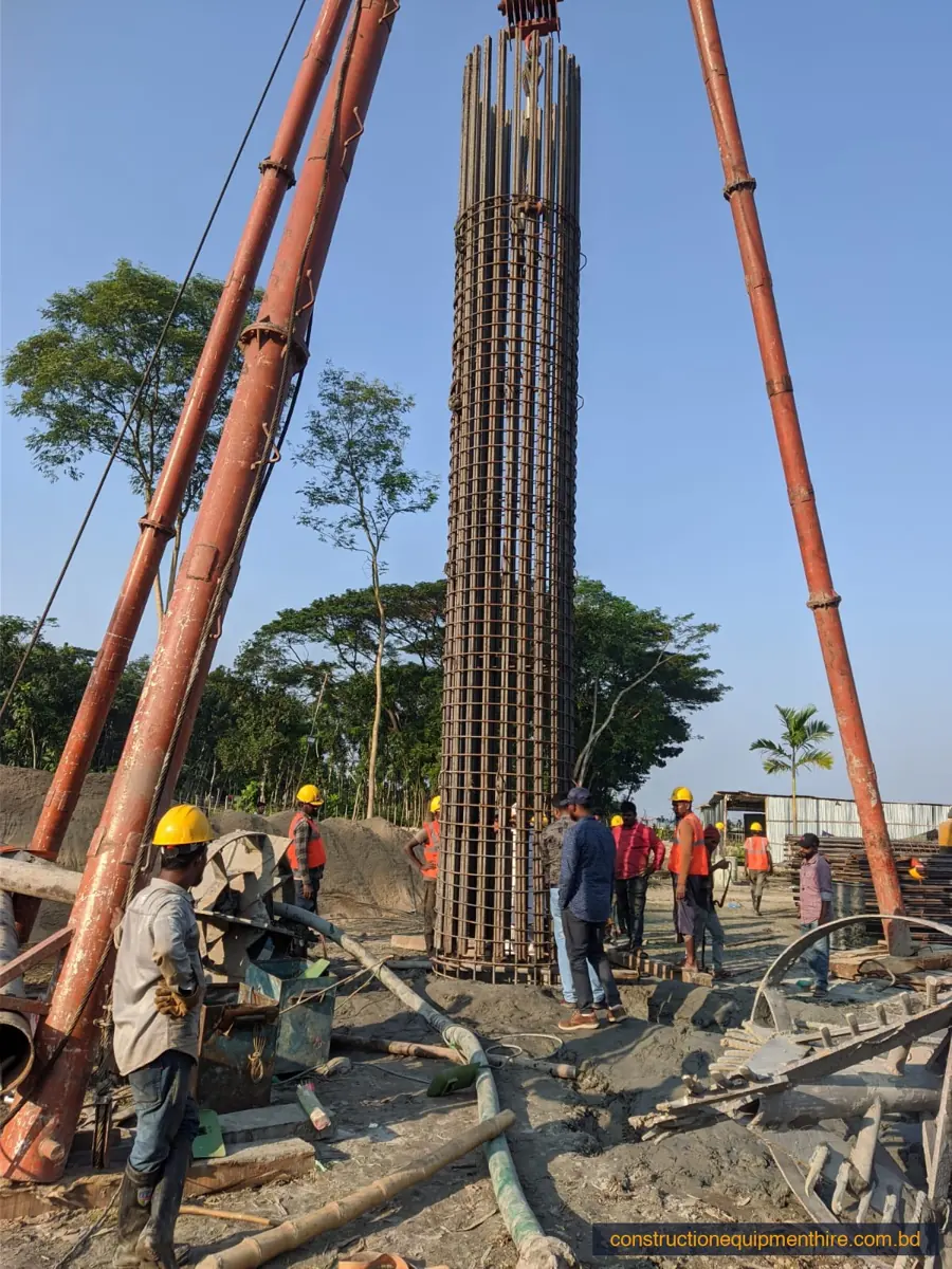 Rebar cage lifted vertically into a bored pile